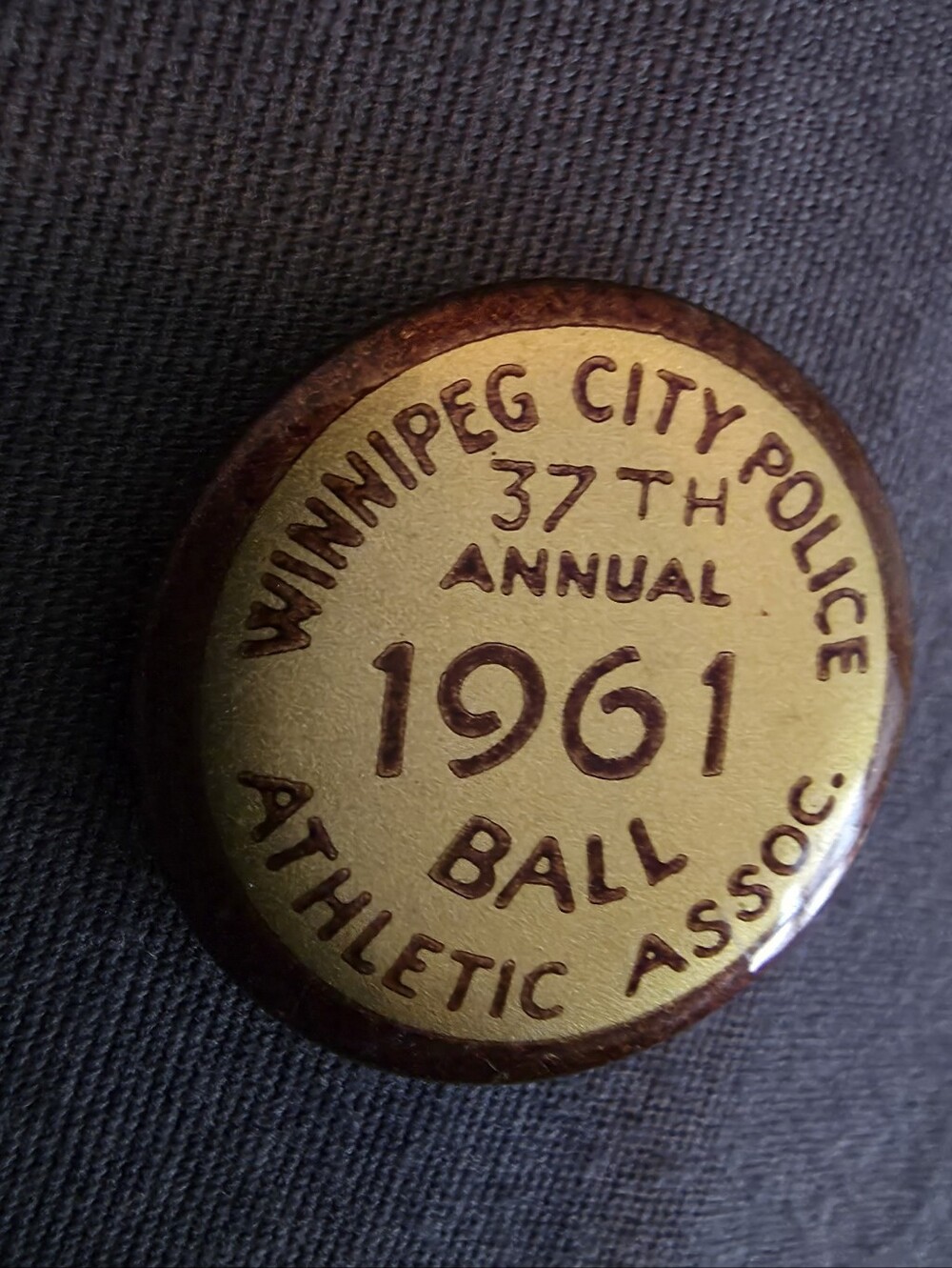 Vintage commemorative pin or token from the 37th Annual Winnipeg City Police
